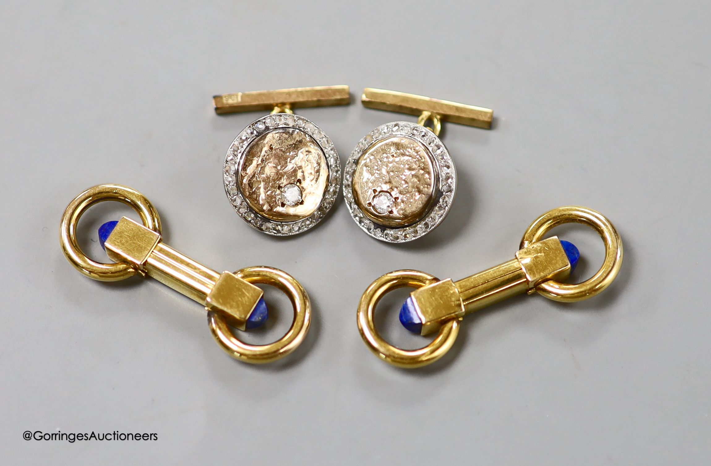 A pair of 9ct and diamond set circular cufflinks, 15mm, gross 12.4 grams and a pair of gold plated? and lapis lazuli set cufflinks by Alfred Dunhill.